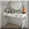 F29. Cross legged 2-drawer vanity. 30”h x 44”w x 20”d 